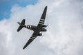 Underside of a Douglas DC-3 transport plane flying above Biggin HIll