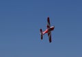 Underside of red Model Airplane Flying