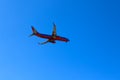 Underside of Southwest Airlines jet in air Royalty Free Stock Photo