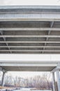 Underside / underpass of two interstate bridges south of the Twin Cities - cement bridges with forest next to the Minnesota River