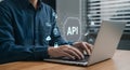 Understanding application programming interface api developer using laptop for development Royalty Free Stock Photo