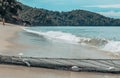 Historical The Fisihing Net Touching The Sand With The Ocean In The Daytime Royalty Free Stock Photo