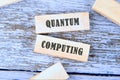 Understanding quantum computing through wooden blocks on a rustic wooden surface