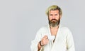 Understanding Your Daily Rhythms. Bearded man with mug. Breakfast concept. Man with beard in bathrobe enjoy morning