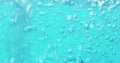 Underwater air bubbles in blue water pouring Royalty Free Stock Photo