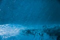 Underwater barrel wave in tropical ocean. Wave texture in sea