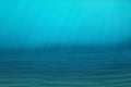 Underwater blue background in sea, ocean, with volume light. 3d rendering