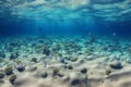 Underwater blue ocean background with sandy sea bottom and coral reefs. Royalty Free Stock Photo