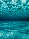 Underwater blue sea, sandy sea bottom