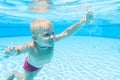 Underwater boy with an empty bottle Royalty Free Stock Photo