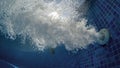 Underwater Bubbles from jacuzzi water jet in thermal spa pool