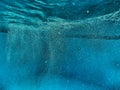 Underwater bubbles in pool Royalty Free Stock Photo
