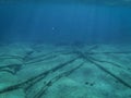 Underwater cables, ocean floor background