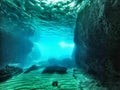 Underwater cave with lightfall