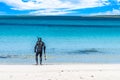 Underwater fisherman waiting on the beach