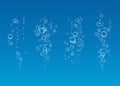 Underwater fizzing air bubbles flow on blue background.