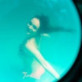 Underwater girl in swimming pool Royalty Free Stock Photo