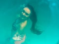 Underwater girl in swimming pool Royalty Free Stock Photo