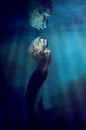 Underwater goddess. A gorgeous mermaid underwater - ALL design on this image is created from scratch by Yuri Arcurs team Royalty Free Stock Photo