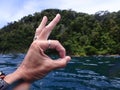 Underwater hand signal OK for scuba diving. Royalty Free Stock Photo