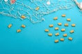 Underwater life represented with goldfish crackers on blue background