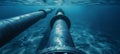 Underwater metal conduit for subsea oil and gas pipeline transport in blue ocean Royalty Free Stock Photo