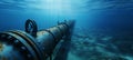 Underwater metal conduit for subsea oil and gas pipeline transport in blue ocean Royalty Free Stock Photo