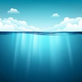 Underwater ocean surface. Blue water background. Clean nature sea underwater backdrop with sky Royalty Free Stock Photo