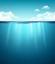 Underwater ocean surface. Blue water background. Clean nature sea underwater backdrop with sky Royalty Free Stock Photo