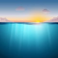 Underwater ocean surface. Blue water background and sunset. Clean nature sea underwater backdrop with sky Royalty Free Stock Photo