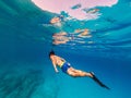 Underwater photo freediver swim in clear sea