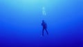 Scuba diver in the deep blue sea Royalty Free Stock Photo