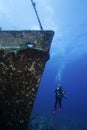 An underwater photographer on a shipwreck in the Bahama Islands