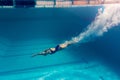 underwater picture of young female swimmer exercising Royalty Free Stock Photo