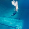 underwater picture of young female swimmer exercising Royalty Free Stock Photo
