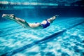 underwater picture of young female swimmer exercising Royalty Free Stock Photo