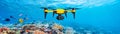 Underwater robots or drones used in marine conservation technology monitor coral reefs and fish populations, displaying