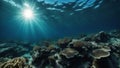 underwater scene with coral reef A dark blue ocean surface seen from underwater. The water is clear and calm, and the sun is high Royalty Free Stock Photo