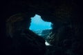Underwater scene with tunnel cave in blue ocean Royalty Free Stock Photo