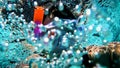 Underwater scuba diver colorful splash effect