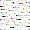 Underwater seamless pattern with different multi-colored fish.