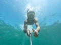 Underwater selfie shot with selfie stick. Royalty Free Stock Photo