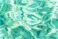 Underwater shallow waves rippling turquoise water in a sea background