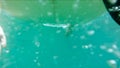 Underwater shots of a Man with his surfboard