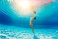 Underwater swimming and reflection in water Royalty Free Stock Photo