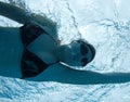 Underwater swimming woman