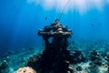 Underwater temple in blue ocean near Amed, Bali. Diving site in Bali