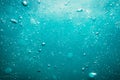 Underwater turquoise texture in ocean. Bubbles in tropical sea. Royalty Free Stock Photo