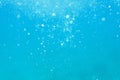 Underwater turquoise texture in ocean. Bubbles in tropical sea. Royalty Free Stock Photo