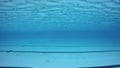 Underwater video of swimming pool with lane divider lines